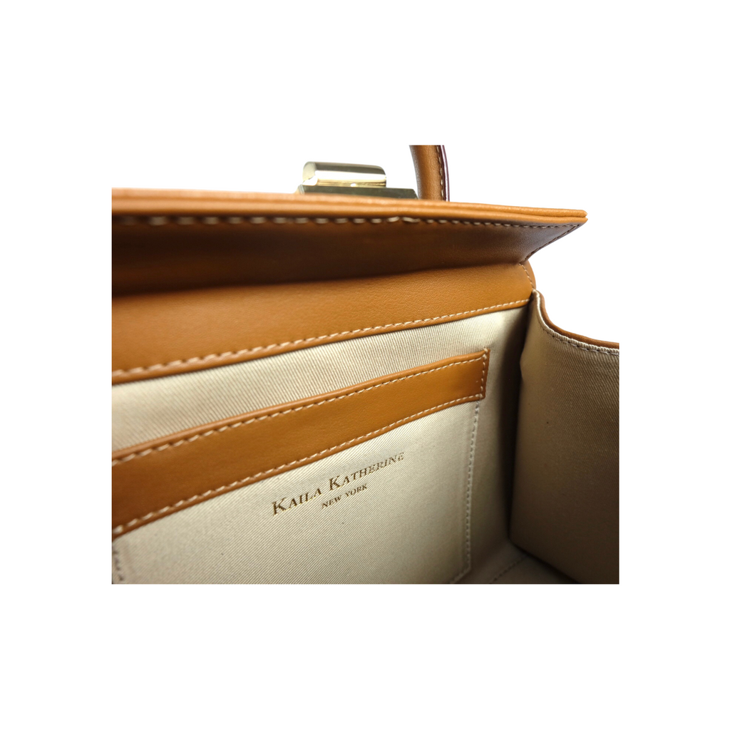 cream inside upholstery of tan Kaila Katherine vegan leather handbag