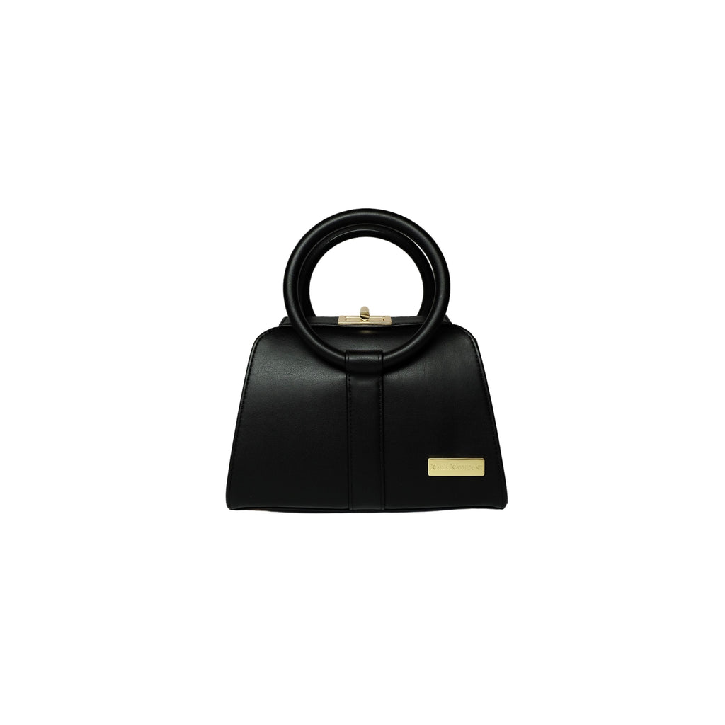 black kaila katherine vegan leather handbag with circular handle