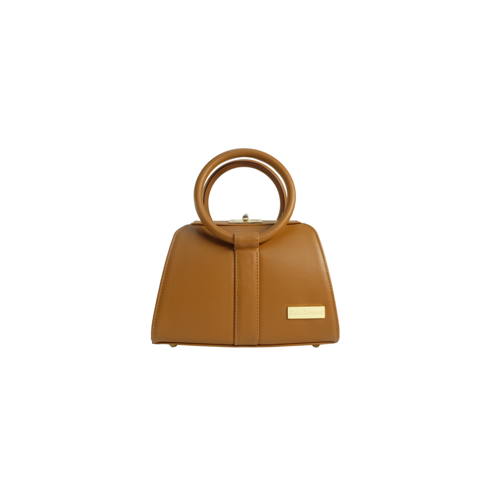 tan kaila katherine vegan leather handbag with circular handle