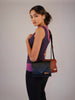 girl wearing two kaila katherine vegan leather brixton clutch shoulderbags in black and tan