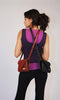 dark hair girl wearing burgundy and black kaila katherine vegan leather brixton clutch shoulderbags